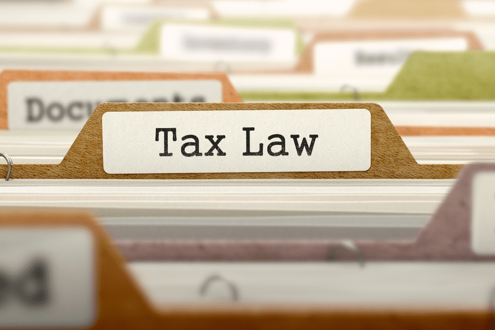 Tax planning in West Monroe, LA by Niswanger Law LLC. Image of a file folder labeled "Tax Law" among other office files, highlighting the firm’s dedication to organized legal solutions for tax planning and compliance.